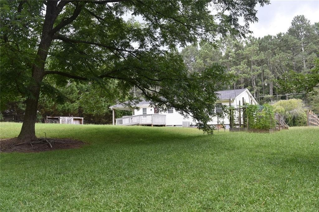 3 bedroom, 2 bathroom, 1,208 sq ft single family residence for sale at 3040 Land Road, Alpharetta, GA 30004 — photo 2