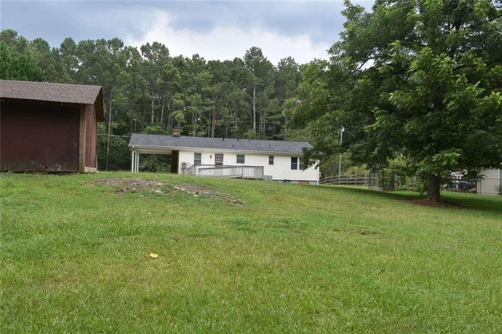 3 bedroom, 2 bathroom, 1,208 sq ft single family residence for sale at 3040 Land Road, Alpharetta, GA 30004 — photo 4