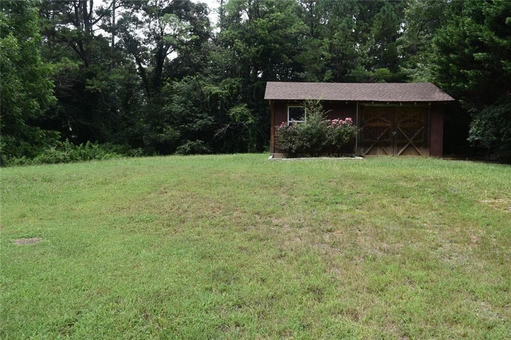 3 bedroom, 2 bathroom, 1,208 sq ft single family residence for sale at 3040 Land Road, Alpharetta, GA 30004 — photo 5