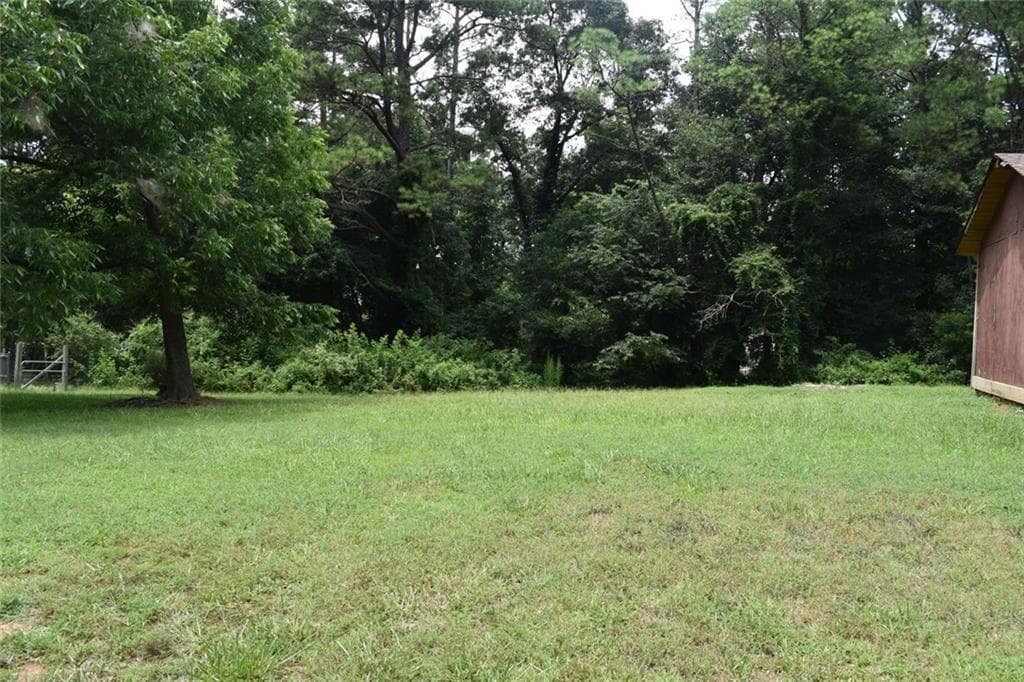 3 bedroom, 2 bathroom, 1,208 sq ft single family residence for sale at 3040 Land Road, Alpharetta, GA 30004 — photo 6