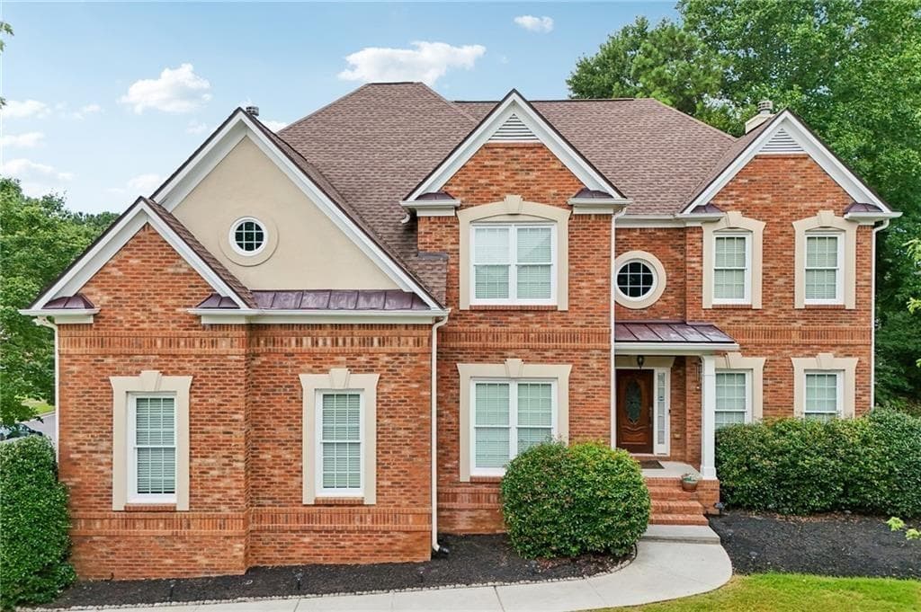 6 bedroom, 5 bathroom, 4,879 sq ft single family residence for sale at 3856 Creekview Ridge Drive, Buford, GA 30518