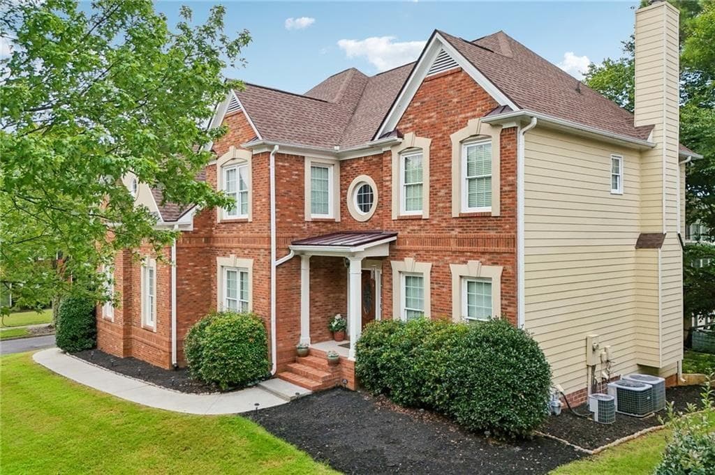 6 bedroom, 5 bathroom, 4,879 sq ft single family residence for sale at 3856 Creekview Ridge Drive, Buford, GA 30518 — photo 2