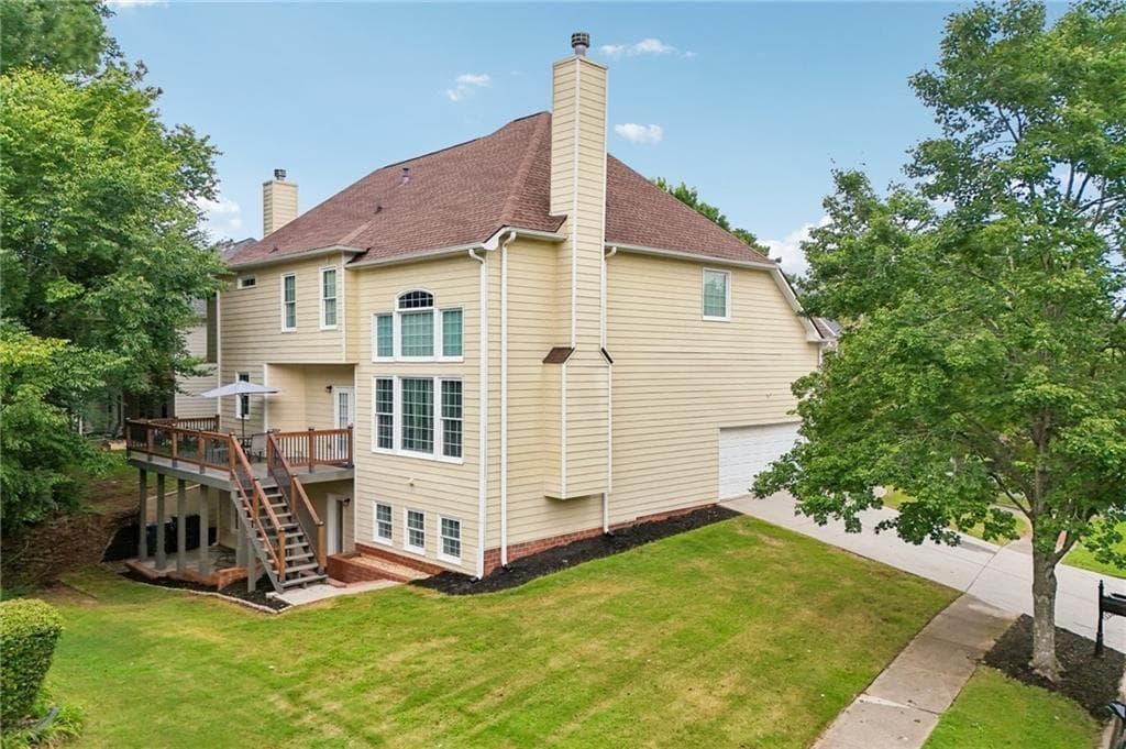 6 bedroom, 5 bathroom, 4,879 sq ft single family residence for sale at 3856 Creekview Ridge Drive, Buford, GA 30518 — photo 3