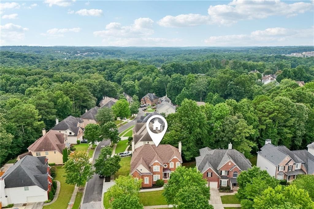 6 bedroom, 5 bathroom, 4,879 sq ft single family residence for sale at 3856 Creekview Ridge Drive, Buford, GA 30518 — photo 8