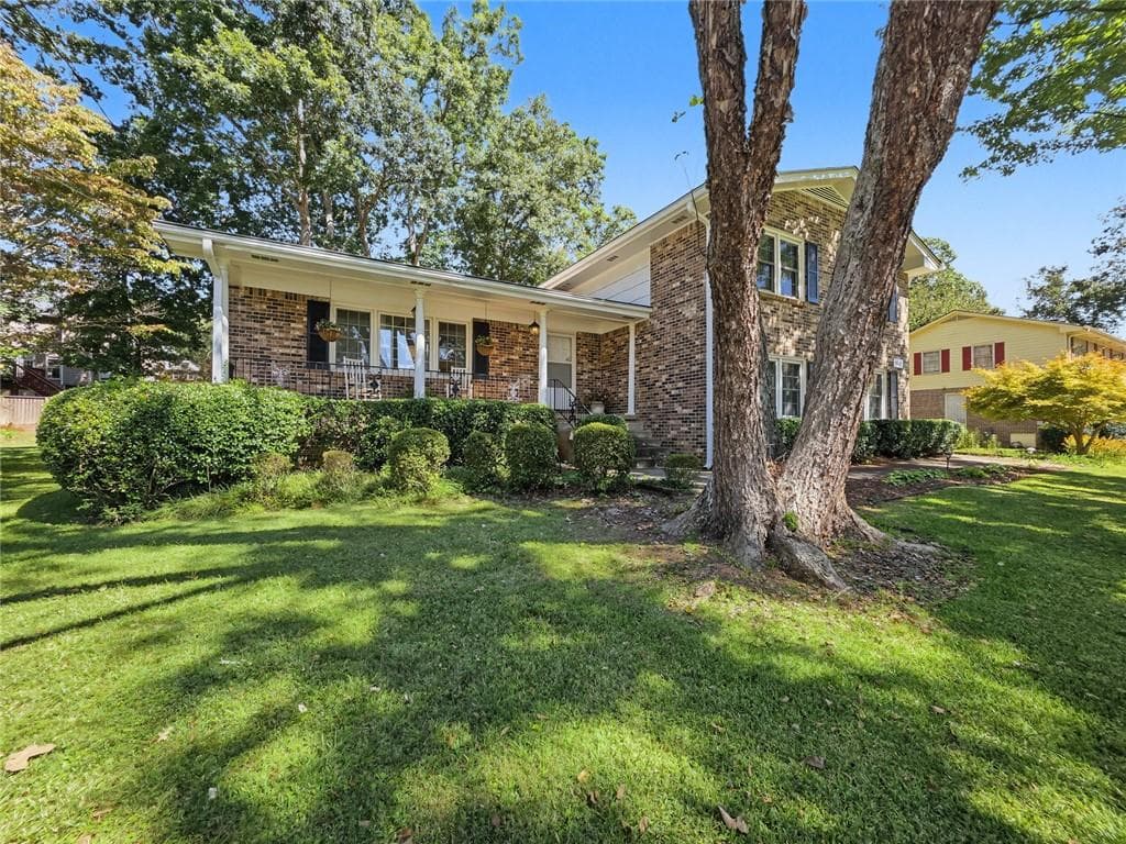4 bedroom, 3 bathroom, 2,125 sq ft single family residence for sale at 4162 Cimarron Drive, Clarkston, GA 30021 — photo 2