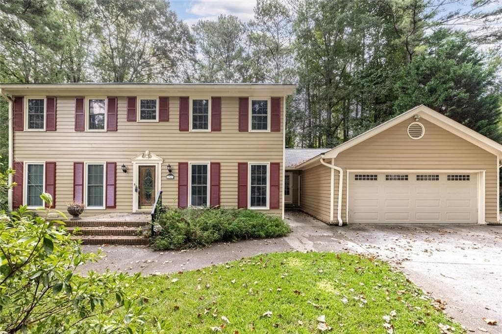 5 bedroom, 4 bathroom, 3,356 sq ft single family residence for sale at 1942 Musket Court, Smoke Rise, GA 30087 — photo 4