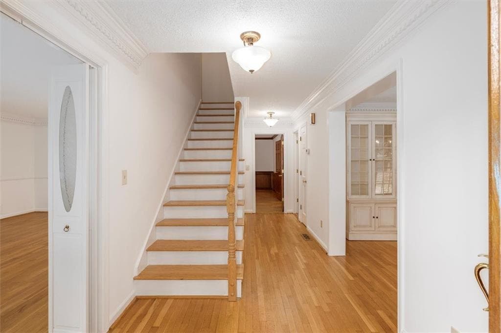 5 bedroom, 4 bathroom, 3,356 sq ft single family residence for sale at 1942 Musket Court, Smoke Rise, GA 30087 — photo 5