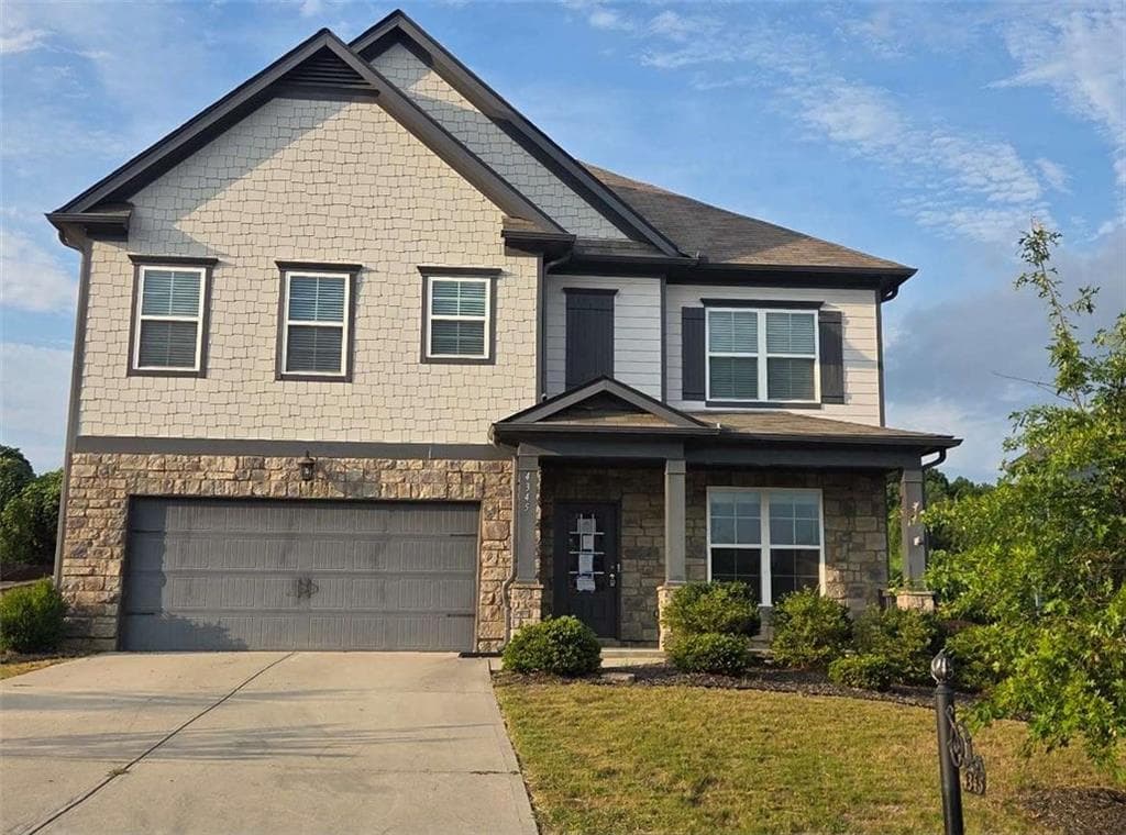 5 bedroom, 3 bathroom, 2,562 sq ft single family residence for sale at 4345 Sunflower Circle, Cumming, GA 30040 — photo 2