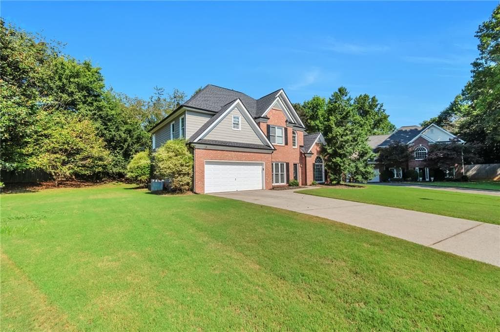 4 bedroom, 3 bathroom, 2,541 sq ft single family residence for sale at 875 Cedar Creek Drive, Suwanee, GA 30024 — photo 2