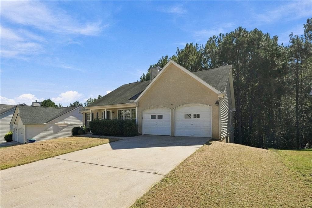 4 bedroom, 3 bathroom, 1,343 sq ft single family residence for sale at 5741 Village Loop, Fairburn, GA 30213 — photo 2