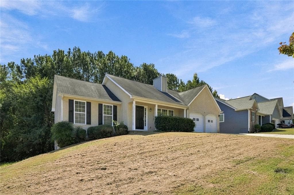 4 bedroom, 3 bathroom, 1,343 sq ft single family residence for sale at 5741 Village Loop, Fairburn, GA 30213 — photo 4