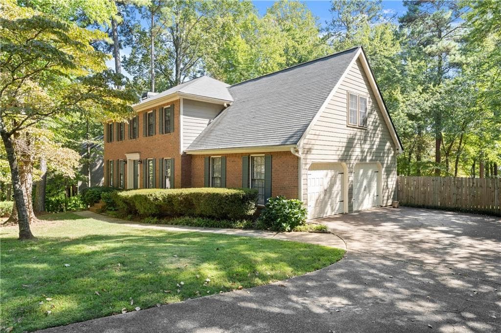4 bedroom, 3 bathroom, 2,602 sq ft single family residence for sale at 2023 Greyfield Drive, Kennesaw, GA 30152 — photo 2