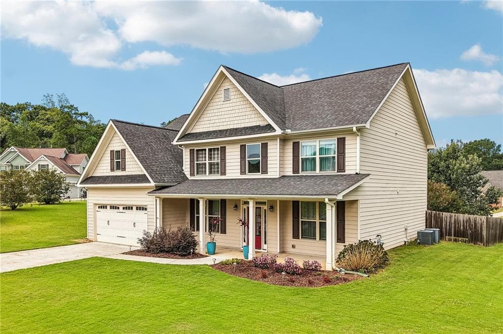 5 bedroom, 3 bathroom, 2,961 sq ft single family residence for sale at 7410 John Pirkle Drive, Cumming, GA 30028 — photo 2