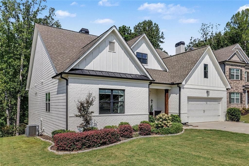 4 bedroom, 3 bathroom, 5,168 sq ft single family residence for sale at 2058 Sydney Cove, Buford, GA 30518 — photo 3