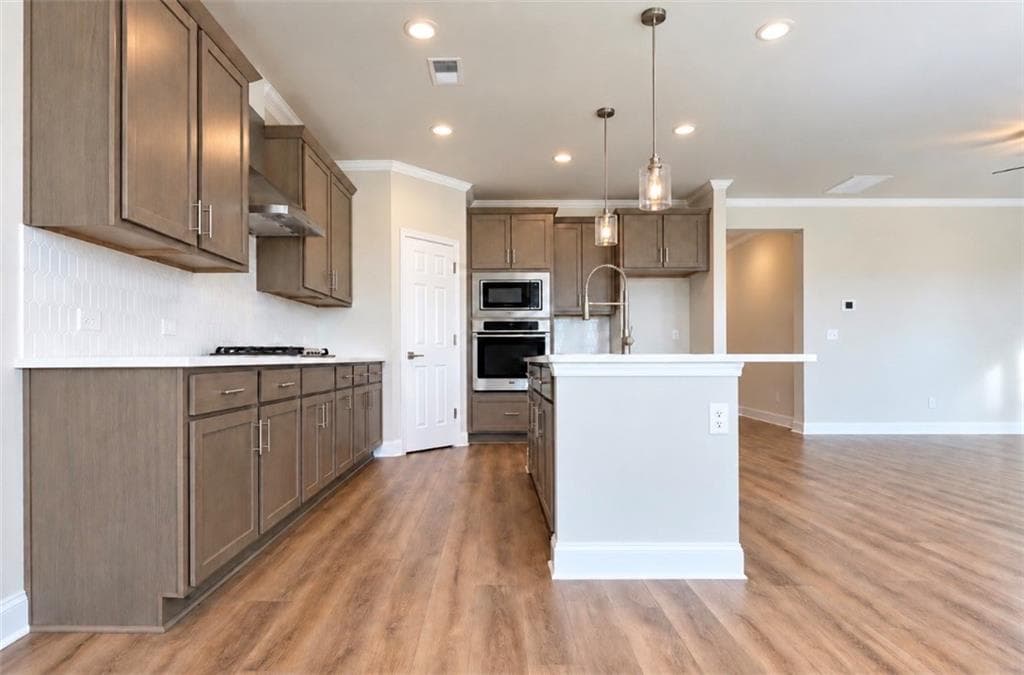 4 bedroom, 4 bathroom, 2,559 sq ft single family residence for sale at 389 Grand Wehunt Drive, Hoschton, GA 30548 — photo 4