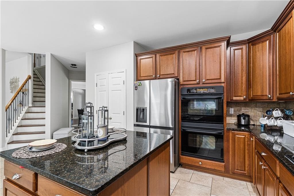 5 bedroom, 4 bathroom, 3,238 sq ft single family residence for sale at 100 Northbrooke Trace, Woodstock, GA 30188 — photo 6