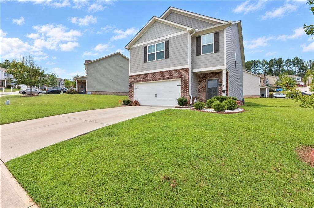 4 bedroom, 3 bathroom, 2,440 sq ft single family residence for sale at 309 Augusta Woods Drive, Villa Rica, GA 30180 — photo 2