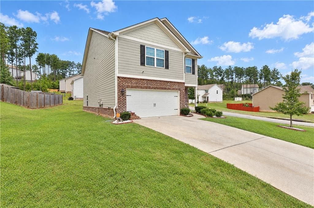 4 bedroom, 3 bathroom, 2,440 sq ft single family residence for sale at 309 Augusta Woods Drive, Villa Rica, GA 30180 — photo 3