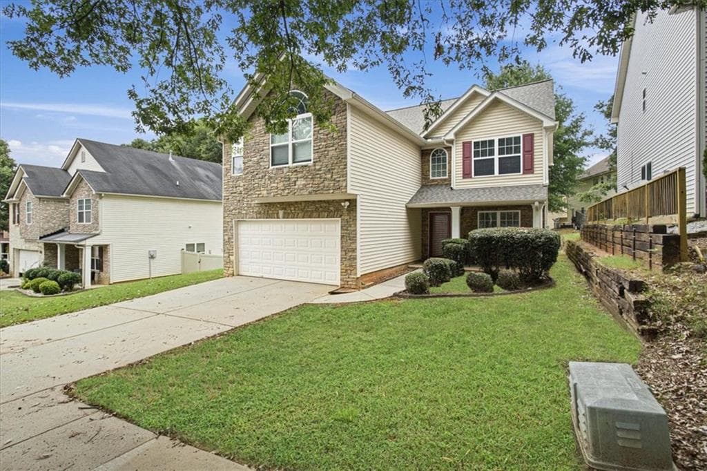 4 bedroom, 3 bathroom, 2,872 sq ft single family residence for sale at 4779 Chafin Point Court, Snellville, GA 30039 — photo 2