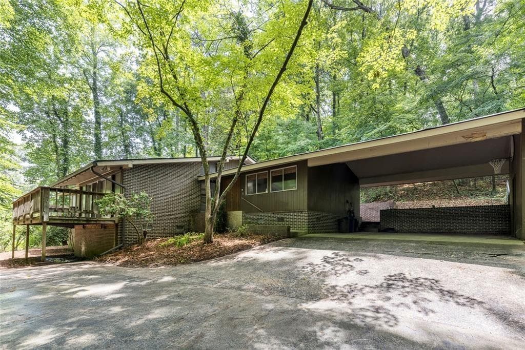 4 bedroom, 3 bathroom, 2,512 sq ft single family residence for sale at 4961 Rebel Trail, Atlanta, GA 30327 — photo 3