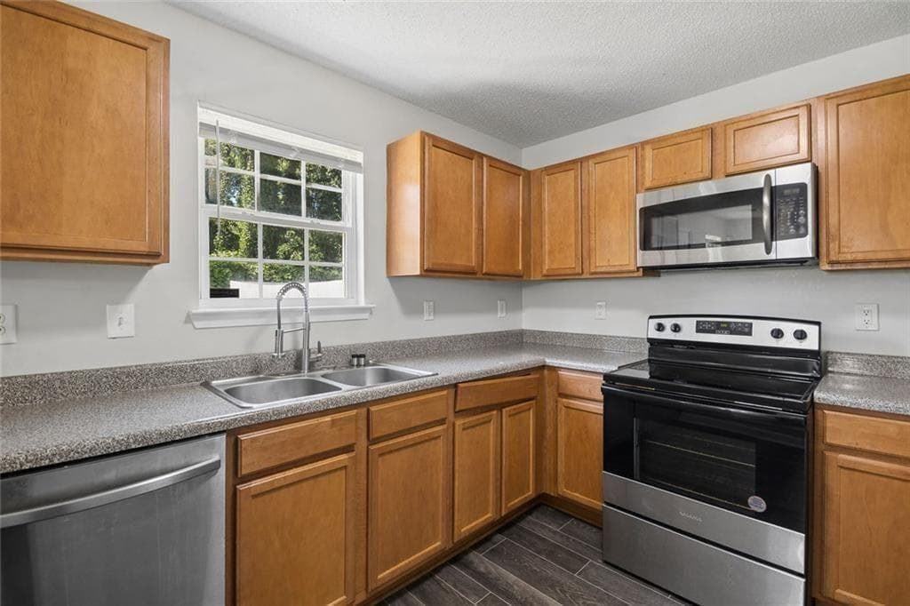 3 bedroom, 3 bathroom, 1,902 sq ft single family residence for sale at 1174 Brookstone Road, Atlanta, GA 30349 — photo 5