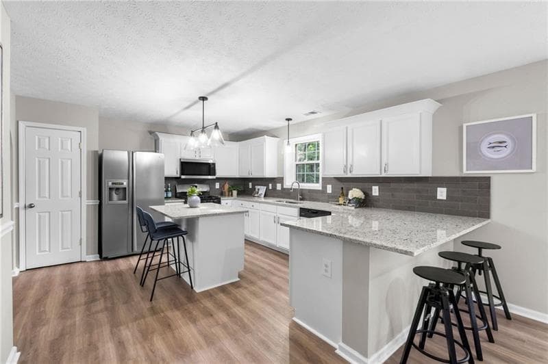 6 bedroom, 4 bathroom, 3,576 sq ft single family residence for sale at 5077 Newpark Drive, Acworth, GA 30101 — photo 4