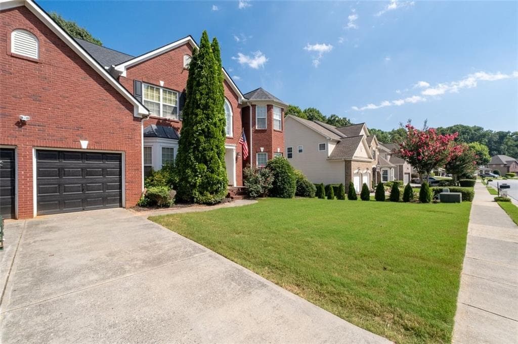 6 bedroom, 5 bathroom, 5,108 sq ft single family residence for sale at 2989 Heritage Oaks Circle, Dacula, GA 30019 — photo 4
