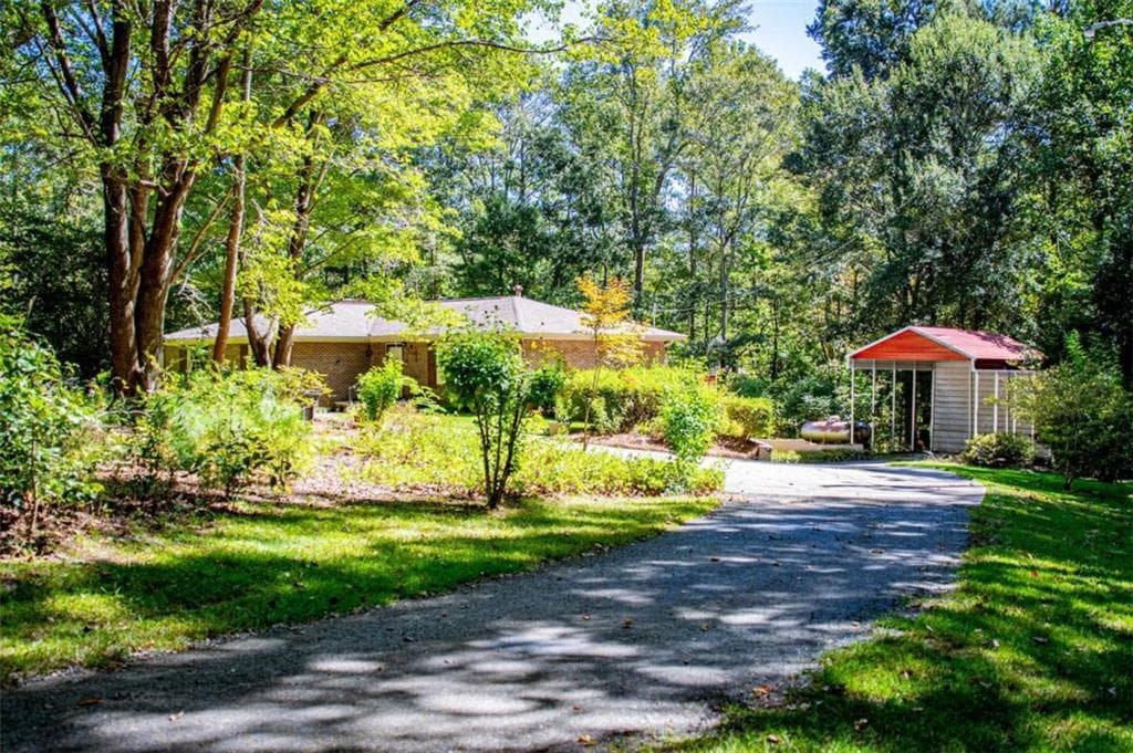 4 bedroom, 3 bathroom, 1,612 sq ft single family residence for sale at 59 Hutcheson Ferry Road, Whitesburg, GA 30185 — photo 2