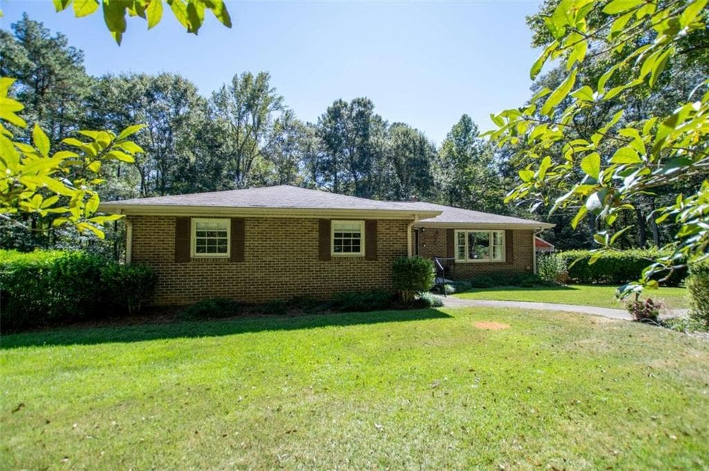 4 bedroom, 3 bathroom, 1,612 sq ft single family residence for sale at 59 Hutcheson Ferry Road, Whitesburg, GA 30185 — photo 3