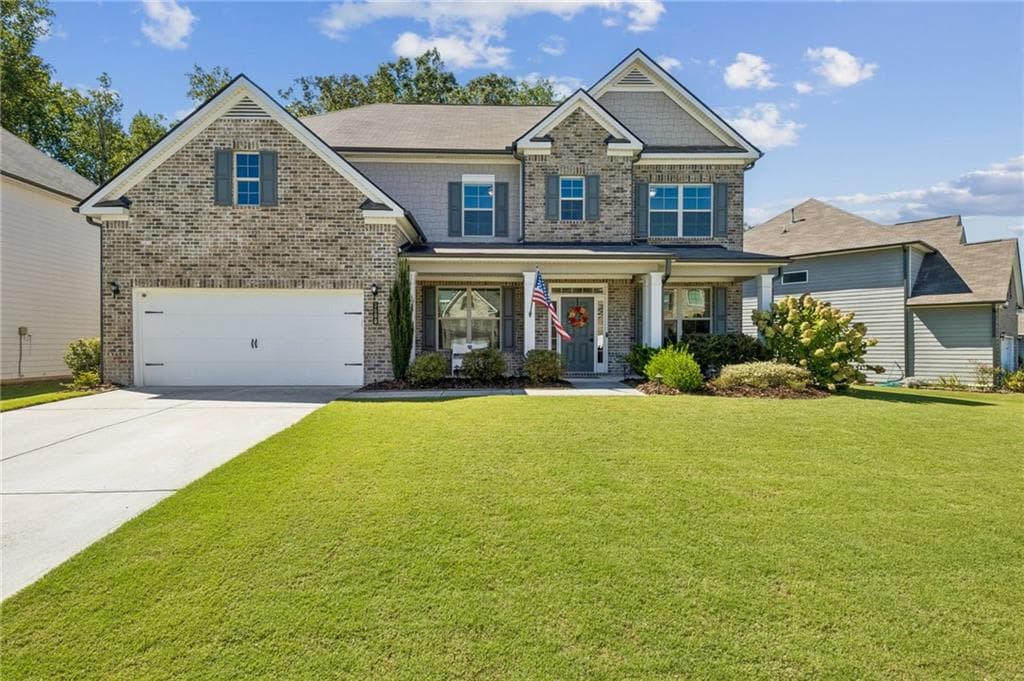5 bedroom, 4 bathroom, 3,484 sq ft single family residence for sale at 3600 Deaton Trail, Buford, GA 30519 — photo 2