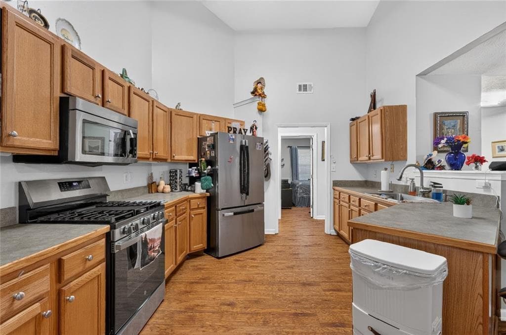 4 bedroom, 2 bathroom, 2,330 sq ft single family residence for sale at 4692 Devencrest Lane, Buford, GA 30519 — photo 3