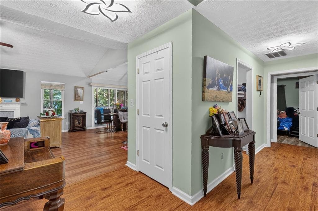 4 bedroom, 2 bathroom, 2,330 sq ft single family residence for sale at 4692 Devencrest Lane, Buford, GA 30519 — photo 5