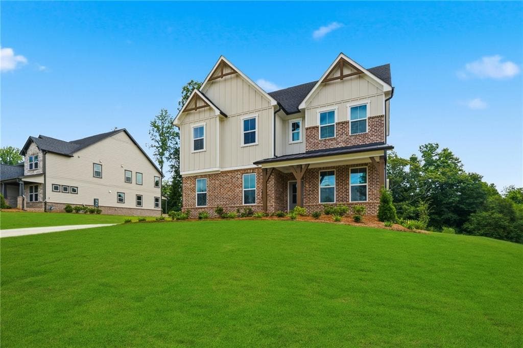 5 bedroom, 4 bathroom, 3,133 sq ft single family residence for sale at 5890 Sweet Acacia, Cumming, GA 30028 — photo 2
