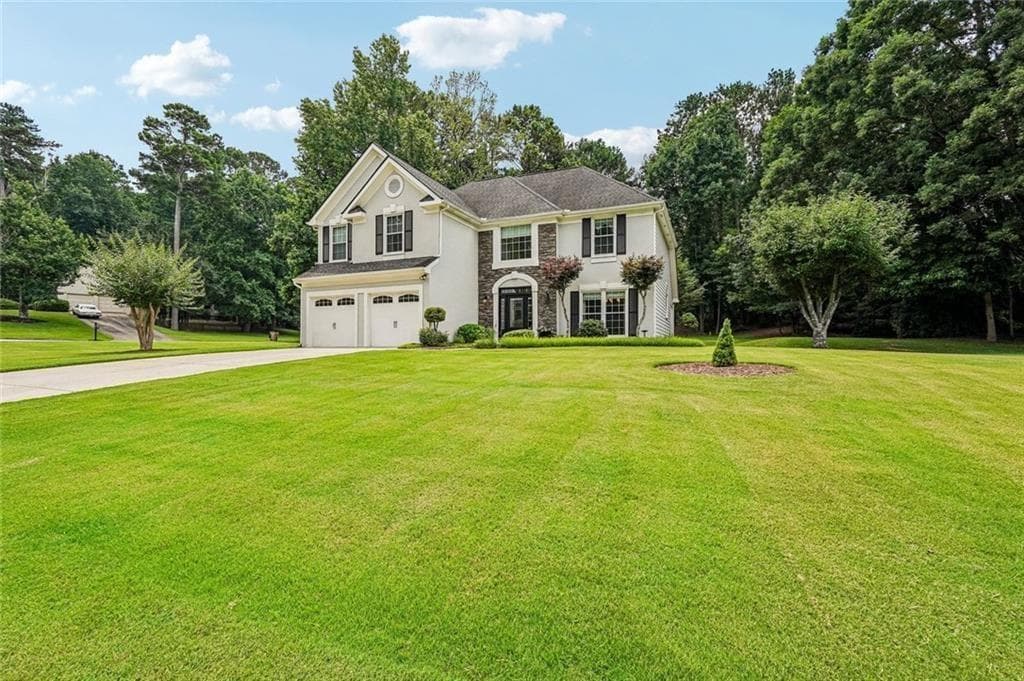 4 bedroom, 3 bathroom, 2,672 sq ft single family residence for sale at 162 St Martin Drive, Suwanee, GA 30024 — photo 2