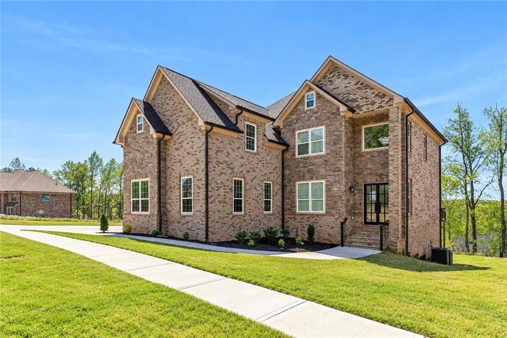 5 bedroom, 6 bathroom single family residence for sale at 5618 Live Sage Drive, Atlanta, GA 30349 — photo 1 of 47