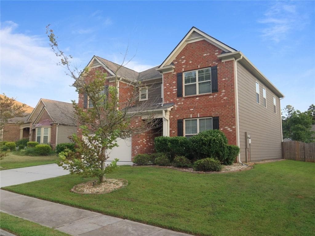 5 bedroom, 3 bathroom, 2,885 sq ft single family residence for sale at 536 Wolf Pack Lane, Atlanta, GA 30349 — photo 2