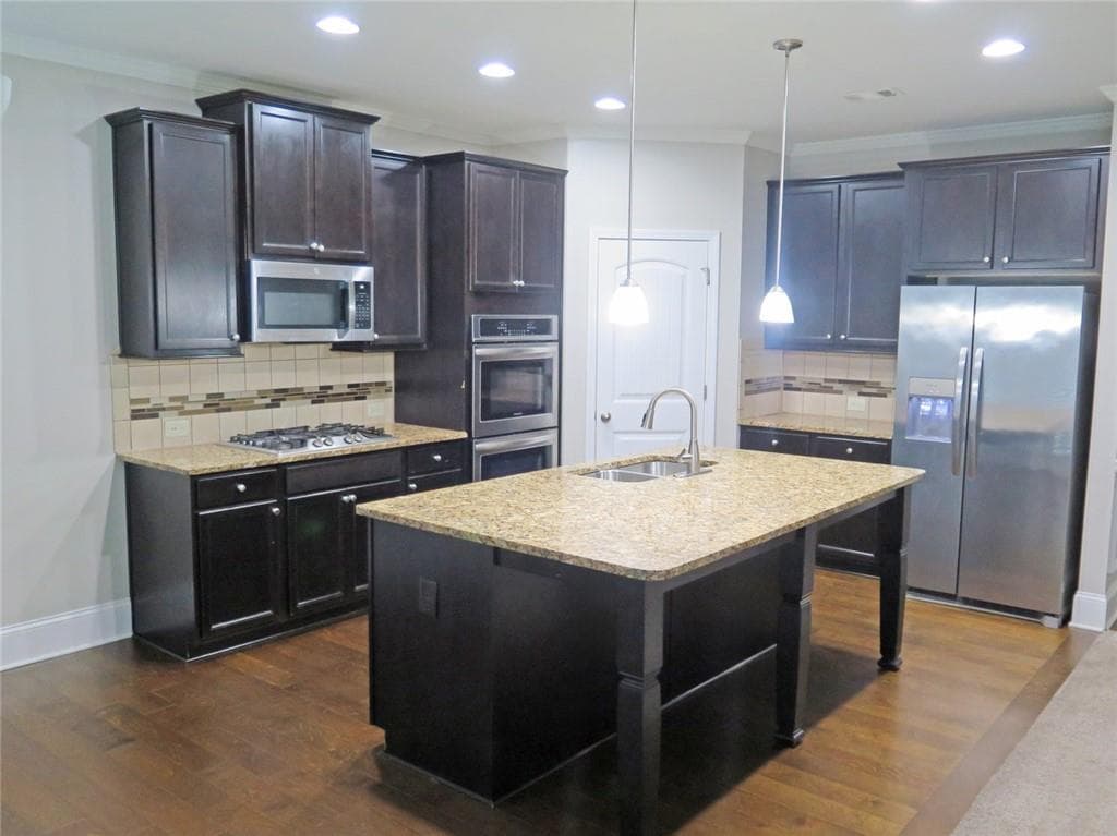 5 bedroom, 3 bathroom, 2,885 sq ft single family residence for sale at 536 Wolf Pack Lane, Atlanta, GA 30349 — photo 6