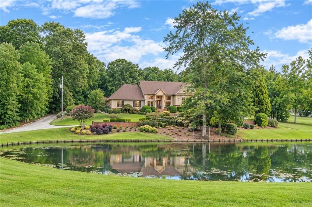 4 bedroom, 6 bathroom, 4,971 sq ft single family residence for sale at 1601 Broadnax Mill Road, Loganville, GA 30052