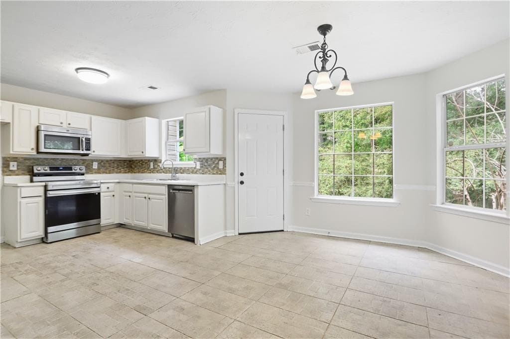 4 bedroom, 3 bathroom, 2,076 sq ft single family residence for sale at 310 Kaden Court, Mcdonough, GA 30252 — photo 8