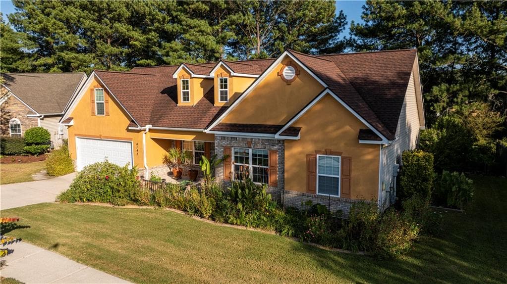 4 bedroom, 3 bathroom, 2,050 sq ft single family residence for sale at 4147 Granite Falls Lane, Loganville, GA 30052 — photo 3