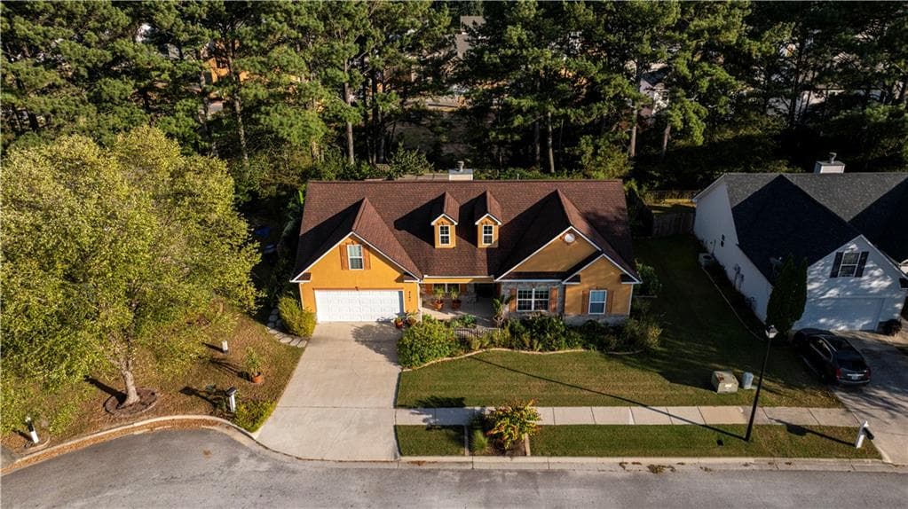 4 bedroom, 3 bathroom, 2,050 sq ft single family residence for sale at 4147 Granite Falls Lane, Loganville, GA 30052 — photo 4