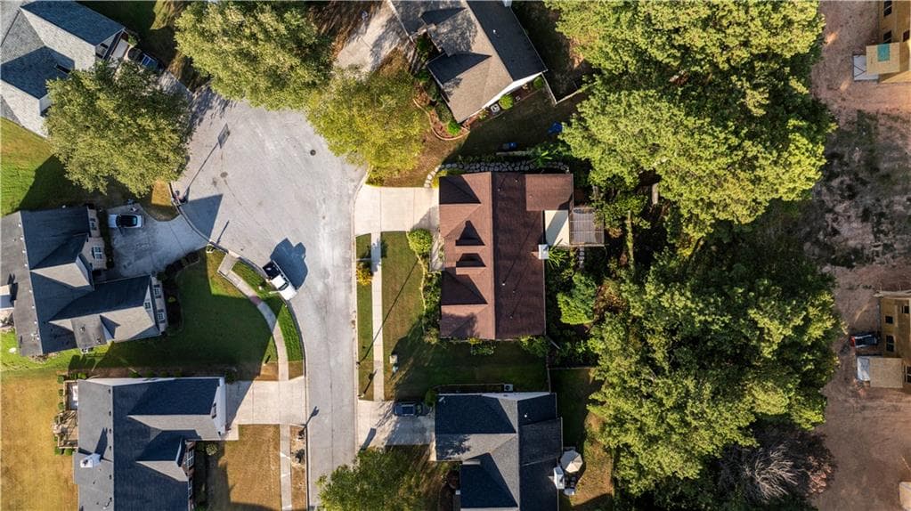4 bedroom, 3 bathroom, 2,050 sq ft single family residence for sale at 4147 Granite Falls Lane, Loganville, GA 30052 — photo 6
