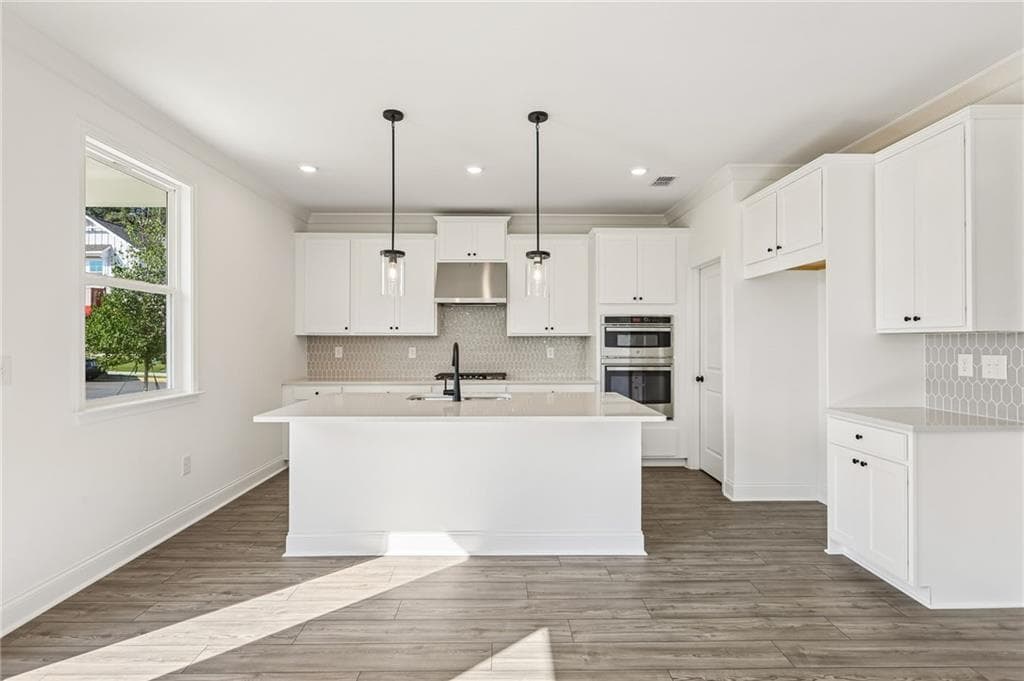 5 bedroom, 4 bathroom, 2,705 sq ft single family residence for sale at 1020 Nichols Farm Circle, Dacula, GA 30019 — photo 6