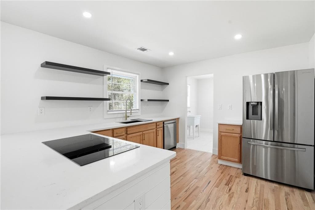4 bedroom, 3 bathroom, 2,200 sq ft single family residence for sale at 5542 Joeclay Drive, Stone Mountain, GA 30088 — photo 9