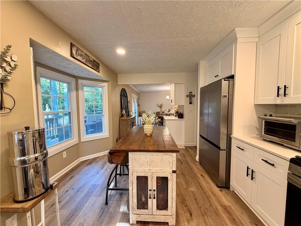 4 bedroom, 2 bathroom, 1,972 sq ft single family residence for sale at 3021 Mills Ridge Drive, Canton, GA 30114 — photo 5