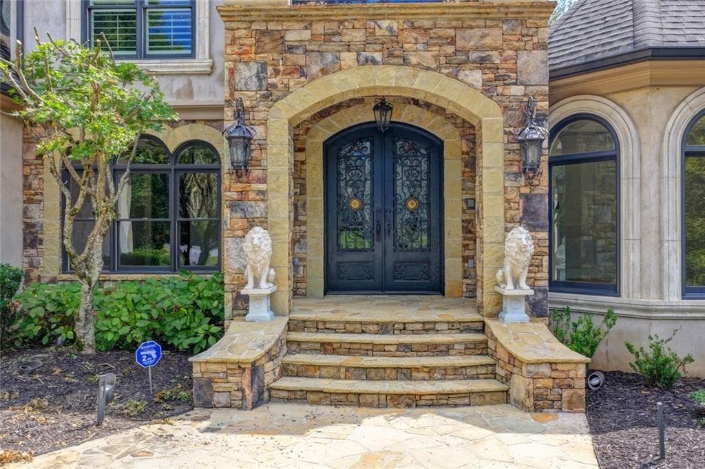 7 bedroom, 8 bathroom, 7,962 sq ft single family residence for sale at 810 Moss Creek Plantation, Duluth, GA 30097 — photo 2