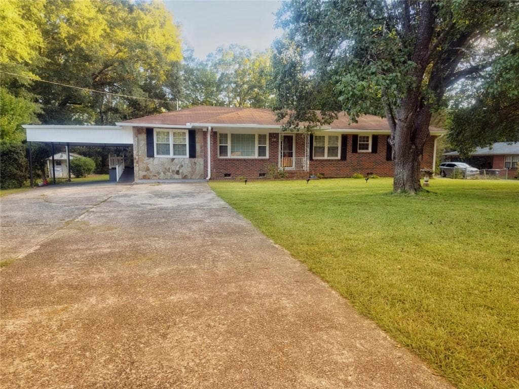 4 bedroom, 2 bathroom, 1,488 sq ft single family residence for sale at 3879 Sharon Drive, Powder Springs, GA 30127 — photo 2