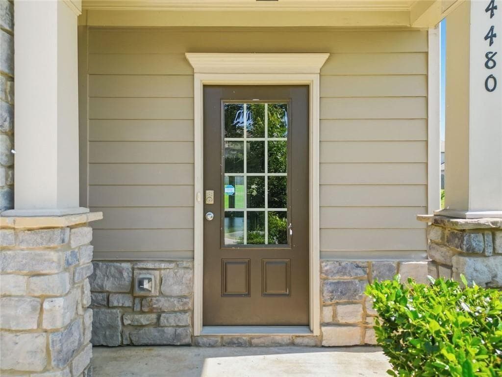 5 bedroom, 3 bathroom, 2,442 sq ft single family residence for sale at 4480 Huron Drive, Cumming, GA 30028 — photo 3
