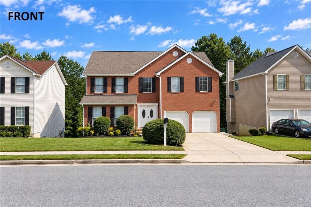 6 bedroom, 4 bathroom, 2,666 sq ft single family residence for sale at 2510 Tolliver Drive, Ellenwood, GA 30294 — photo 4