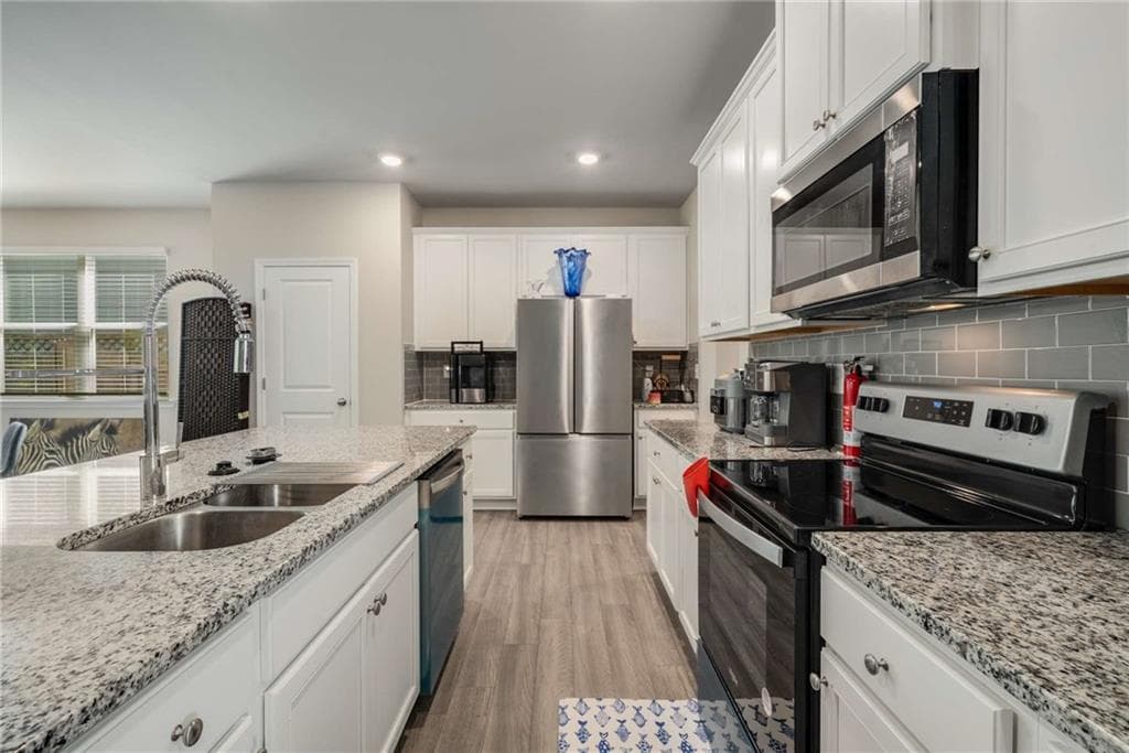 3 bedroom, 3 bathroom, 2,028 sq ft single family residence for sale at 458 Burgundy Terrace, Atlanta, GA 30354 — photo 3